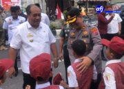 Pembagian 3.250 Bendera Merah Putih, Polres Asahan Turut ikut melakukan pengamanan