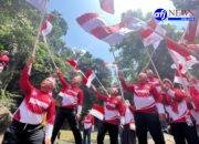 Kapolres Asahan Bersama Forkopimda Kibarkan Bendera Merah Putih di Air Terjun Si Monang-monang