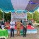 Kepala Desa Perkebunan Negeri Lama memberikan sambutan damal peringatan hari guru di SDN 23 Bilah Hilir