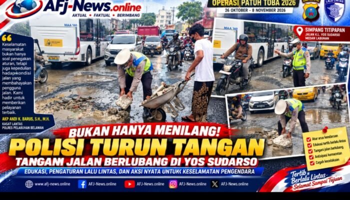 Tak Sekadar Atur Lalu Lintas, Polisi di Belawan Turun Tangan Tangani Jalan Berlubang di Tengah Padatnya Kendaraan